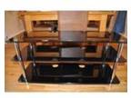 TV stand in smoked glass and chrome. TV and audio stand....